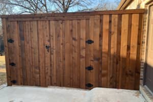 Front gate to a beautiful fence installed in Denton